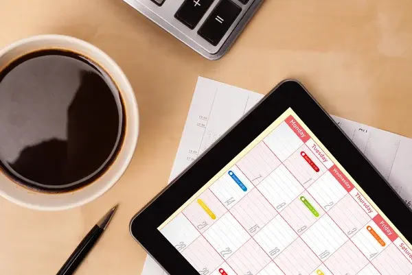 Depositphotos 35296841 stock photo tablet pc showing calendar on