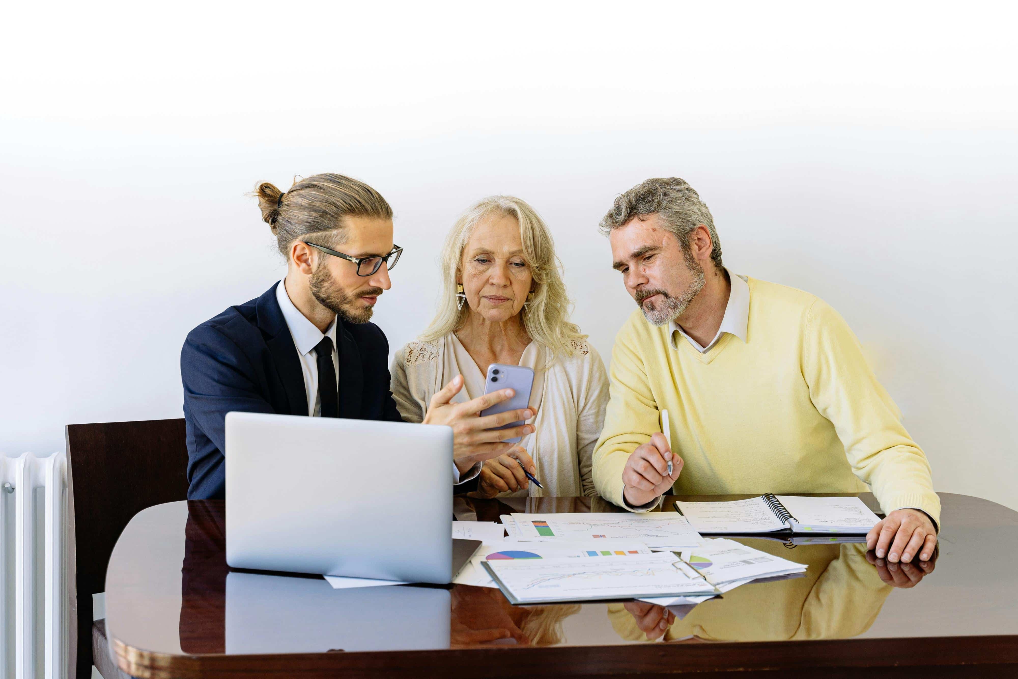 Older couple working with a family accountant